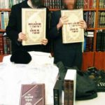 Rabbi Eliyahu Shear and Orphan Chatan Receiving Gifts from Chessed Ve'Emet